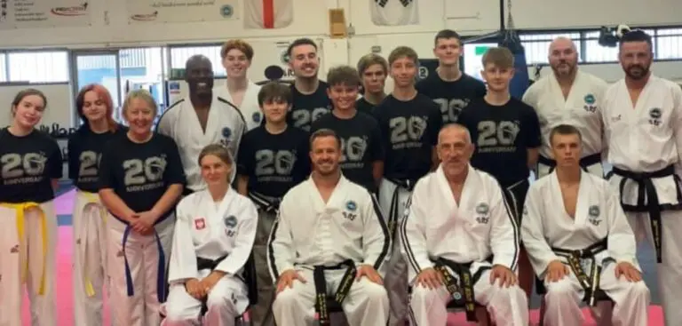 a group of students showing improved confidence through martial arts training